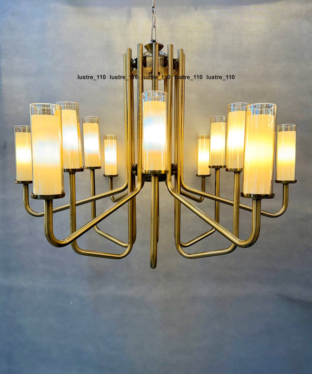 لوستر پذیرایی اورانوس سبک مدرن با رنگ بدنه انتیک ۱۲ شاخه